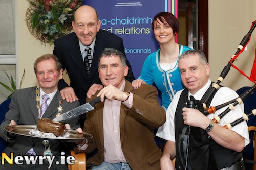 Getting Burns Night off to an early start at a reception in the Newry and Mourne Council Offices. From left: John McArdle, Mayor; William Mitchell, Chairman, Ulster Scots Committee; Cllr Harold McKee, Vice Chairman, Ulster Scots Committee; Michelle Burns, dancer and Desmond Moorehead, piper. Photograph: Columba O'Hare