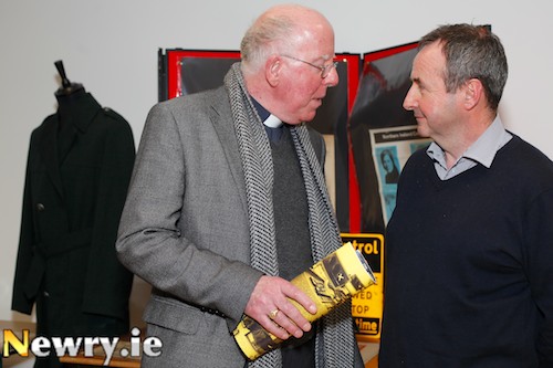 Bishop John McAreavey chats to Cllr Pat McGinn at the opening of the Gaeláras Mhic Ardghail Centre in Newry. Photograph: Columba O'Hare