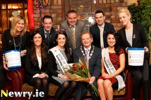 Southern Area Hospice has been chosen as the County Down Rose of Tralee selected charity this year. Included from left: Gemma Murphy, Down Rose Co-ordinator; Victoria Kerr, Southern Area Hospice; Gareth McGreevy, Down Rose Co-ordinator; Nicola McEvoy, Rose of Tralee; Steve Cronnly, National Rose Co-ordinator; Cllr John McArdle, Mayor, Newry and Mourne; Aidan Clarke, Rose Escort and Una Matthews, 2012 County Down Rose. Photograph: Columba O'Hare