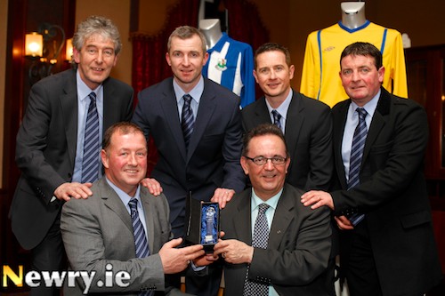 Newry City AFC was launched in the Canal Court Hotel and office bearers of the new club are pictured presenting a memento to Dominic Bradley, MLA in appreciation of local MLA's Karen McKevitt, Danny Kennedy, Mickey Brady and Dominic's work in helping get the club back on it's feet. From left are Mickey Keenan, Coach; Martin McLaughlin, Chairman; Raymond Byrne, Assistant Manager; Dominic Bradley, MLA; Darren Mullen, Manager and Jervis McCaul, Coach. Photograph: Columba O'Hare