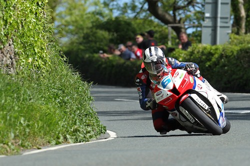 Michael Dunlop (MD Racing) on his way to victory in the Isle of Man TT Supersport Race yesterday to make it four in a row. Photograph: Dave Kneen/ Pacemaker