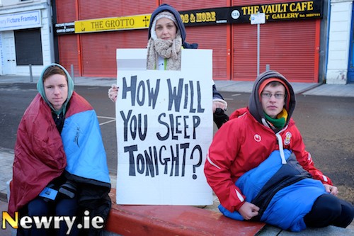 Teresa Kearney from Newry Young Peoples Partnership with two of the young people who sat out in Hill Street last night. Photograph: Columba O'Hare