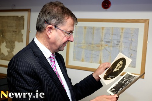 Éamon Ó Cuív TD looking at photographs of his Grandfather Éamon de Valera and his uncle Vivion de Valera from the Donnelly Collection at Newry Museum. Photograph: Columba O'Hare