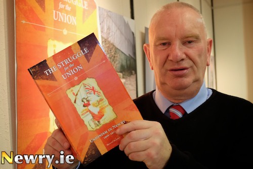 Michael McArdle with his book 
