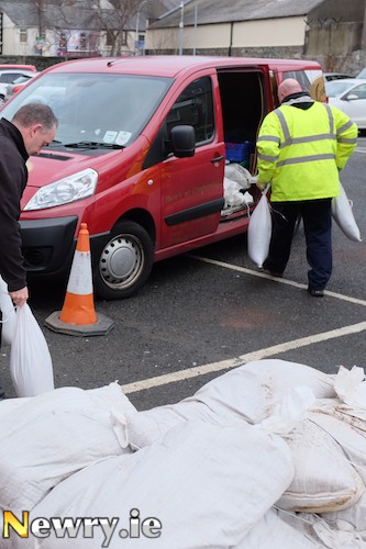 Sandbags getting picked up at the Sports Centre. Photograph: Columba O'Hare