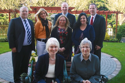 Jerome Burns (DSD), Brian Doran, Chief Executive (SRC), David Vint, Assistant Director of Community & Schools Partnership (SRC),  three of the students who successfully completed the programme, Ann Cooney (Southern Area Hospice) and Eileen Wright, Board of Governors (SRC). 