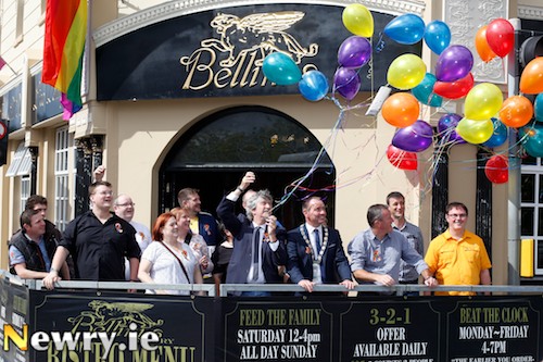 Pride in Newry is well and truly launched. Mickey Brady MLA, Mickey Ruane, Mayor, Newry and Mourne and Conor Murphy MP help members of the Newry Rainbow Community, Bellinis Staff and friends get the Festival started. Photograph: Columba O'Hare