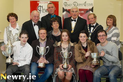 Members of Newpoint Players who won awards for their production of Rozencrantz and Guildenstern are Dead at Newry Drama Festival. Front from left: Neil Heaney, Michael Murphy, Anna Heatley, Mairead Quigley and Killian Foy. Back: Maureen Grant, PRO, Newry Drama Festival; Mac Pollock, Association of Ulster Drama Festivals; Geoffrey O'Keefe, Adjudicator; Gerry McNulty, Chairman, Newry Drama Festival; John McArdle, Mayor, Newry and Mourne and Patricia Slevin, Newry Drama Festival. Photograph: Columba O'Hare Members of Newpoint Players who won awards for their production of Rozencrantz and Guildenstern are Dead at Newry Drama Festival. Front from left: Neil Heaney, Michael Murphy, Anna Heatley, Mairead Quigley and Killian Foy. Back: Maureen Grant, PRO, Newry Drama Festival; Mac Pollock, Association of Ulster Drama Festivals; Geoffrey O'Keefe, Adjudicator; Gerry McNulty, Chairman, Newry Drama Festival; John McArdle, Mayor, Newry and Mourne and Patricia Slevin, Newry Drama Festival. Photograph: Columba O'Hare