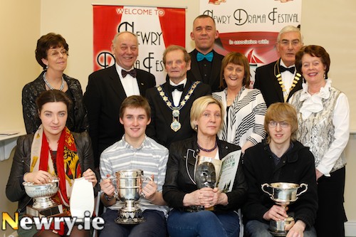 Members of Ballyduff Drama Group who won awards at Newry Drama Festival for their production of Dancing at Lughnasa. Front from left: Kate Canning, Killian Cotter, Ger Canning and Andy McCarthy. Back from left: Christine Farrelly, Treasurer, Newry Drama Festival; Mac Pollock, Association of Ulster Drama Festivals; John McArdle, Mayor, Newry and Mourne; Geoffrey O'Keefe, Adjudicator; Patricia Slevin, Newry Drama Festival; Gerry McNulty, Chairman, Newry Drama Festival and Maureen Grant, PRO, Newry Drama Festival. Photograph: Columba O'Hare Members of Ballyduff Drama Group who won awards at Newry Drama Festival for their production of Dancing at Lughnasa. Front from left: Kate Canning, Killian Cotter, Ger Canning and Andy McCarthy. Back from left: Christine Farrelly, Treasurer, Newry Drama Festival; Mac Pollock, Association of Ulster Drama Festivals; John McArdle, Mayor, Newry and Mourne; Geoffrey O'Keefe, Adjudicator; Patricia Slevin, Newry Drama Festival; Gerry McNulty, Chairman, Newry Drama Festival and Maureen Grant, PRO, Newry Drama Festival. Photograph: Columba O'Hare