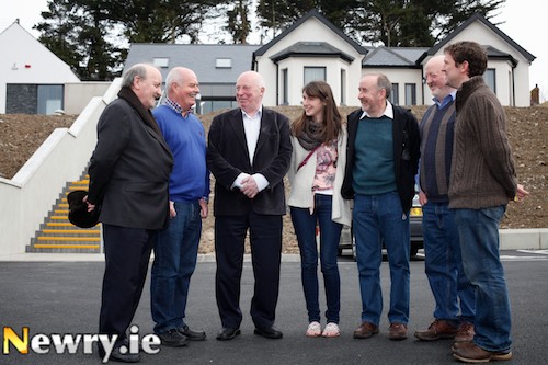 Conradh na Gaeilge President Donnchadh Ó hAodha along with delegates chat to Seamus Mac Dhaibheid, Gaeláras Mhic Ardghail during a visit to the Gaelaras for the Conradh na Gaeilge Ard Fheis. Photograph: Columba O'Hare