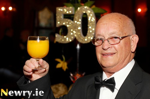 Number One! - Francie Pollock, the very first member of Newry Credit Union toasts the success of the organisation at the 50th Anniversary Dinner. Photograph: Columba O'Hare