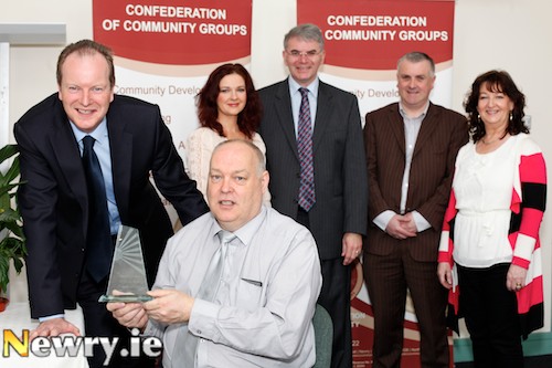 Getting ready for the Shining Light Awards. Included from left: Raymond Jackson, CEO and David Cunningham, Chairman, Confederation of Community Groups pictured with the judging panel, Seanin Graham, Irish News; Hugh Mallon, St Josephs Boys High School; Colin Kavanagh, The Quays and Colette Ruddy, Volunteer Now. Photograph: Columba O'Hare