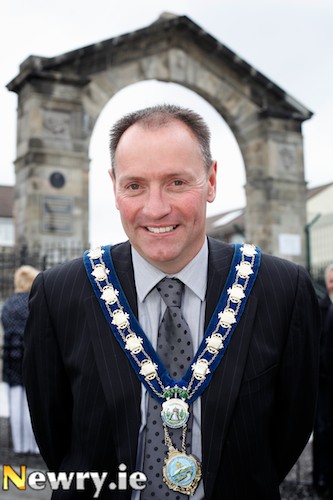 Cllr Mickey Ruane the new Mayor of Newry and Mourne District Council on one of his first assignments opening the restored Linenhall Arch. Photograph: Columba O'Hare