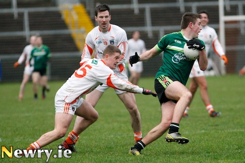 Armagh goal scorer Niall McConville in hot pursuit at the Athletic Grounds. Photograph: Columba O'Hare Armagh goal scorer Niall McConville in hot pursuit at the Athletic Grounds. Photograph: Columba O'Hare