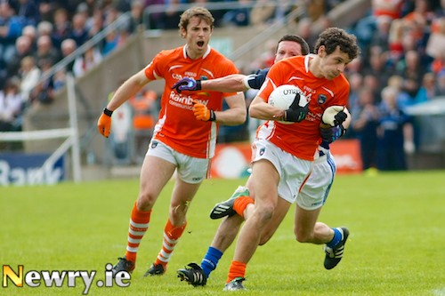 Armagh's Jamie Clarke pushes forward at Breffni Park. Photograph: Columba O'Hare