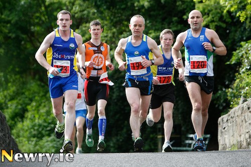 Running down the towpath along Newry Canal during yesterdays Newry City Marathon. Photograph: Columba O'Hare Running down the towpath along Newry Canal during yesterdays Newry City Marathon. Photograph: Columba O'Hare