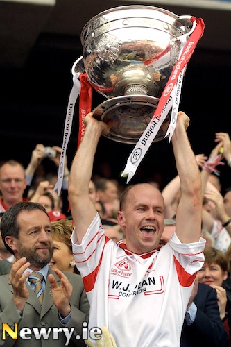 Peter Canavan lifts the Sam Maguire in 2003. Photograph: Columba O'Hare