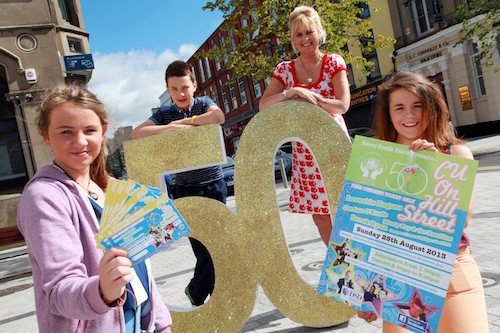 Ciara Wright, James and Sinead Loughran pictured with Deboragh Gorman from the Newry Credit Union with their tickets for the CU on Hill Street Concert.
