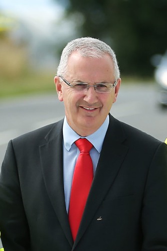 Transport Minister Danny Kennedy has announced the start of a £250,000 resurfacing scheme for the Seven Sisters on the Hilltown Road. Photograph: Kelvin Boyes / Press Eye
