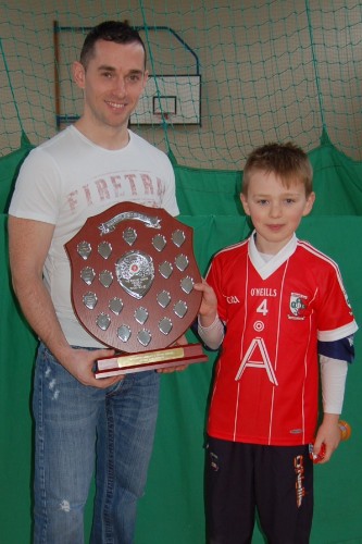 Kevin Hughes presents this years winner Niall Elshaw with his award.