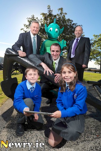 Environment Minister, Mark H Durkan, and David Knott, Environmental Manager, Belfast Harbour, launched the 2013 Green Teacher of the Year Awards with Webster, Belfast Harbour's environmental guardian and St Colman's (Lambeg) pupils, Sofia Woods and Ronan McAree and their teacher Art McKernan, who was one of the six finalists in last year's search for Northern Ireland's greenest teacher.