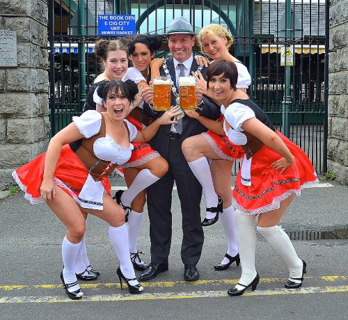 Mayor Mickey Ruane with some of the Oktoberfest girls.