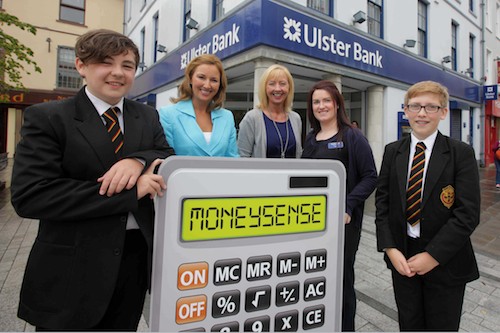 Abbey Christian Brothers’ School pupils Josh Keenan (left) and Micheal Linden (right) help broadcaster Claire McCollum, Jill Smyth Head of MoneySense at Ulster Bank and Ciara McDonnell, customer service officer at Ulster Bank in Newry, launch MoneySense at Home, a new resource which helps parents teach their children all about money.
