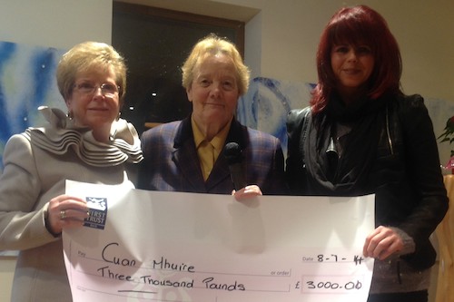 Angela Reilly and Majella Murphy presents a cheque to Sr Consilio Fitzgerald, Cuan Mhuire.