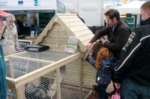 Derek Tiernan of Willowtree Cottage Timber Products promoting their Chicken Coup at the Balmoral Show 2013. 