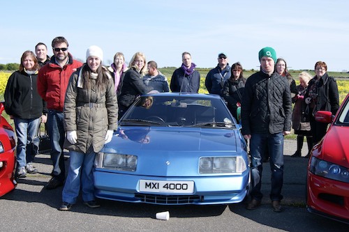Pictured are officers from Newry NPT with members of Headway Newry at Bishopscourt Racing Track.