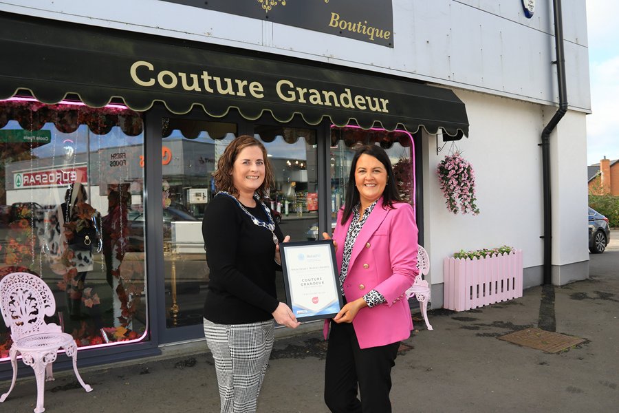 Newry, Mourne and Down District Council Deputy Chairperson, Oonagh Magennis presenting the Retail NI Irish News High Street Hero Silver Award to Couture Grandeur Owner, Yvonne McCoy.