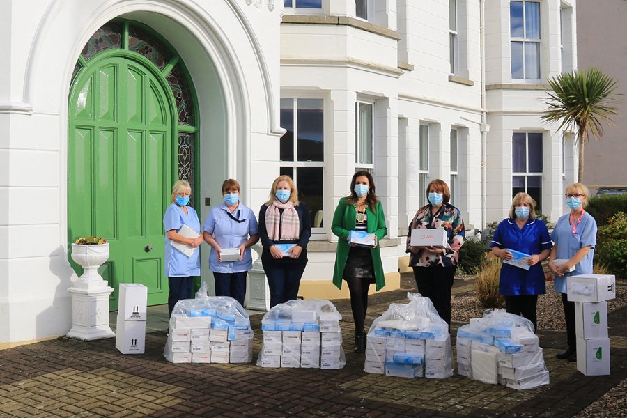 Newry, Mourne and Down District Council Chairperson, Councillor Cathy Mason is pictured with Ann Begley (Manger) and staff from St. Joseph’s Nursing Home receiving a donation of PPE.  The distribution of PPE to a number of health care facilities across the district is courtesy of Consul General Madam Zhang under the friendly relations arrangement between Council and Changchun, China.