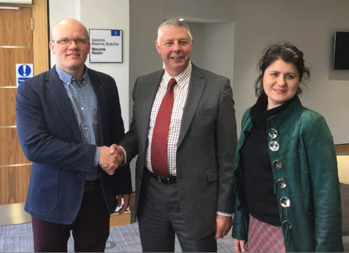 Chairman of Newry, Mourne and Down District Council Strategic Policy and Resources Committee, Councillor Robert Burgess with Vladimir Diadik and his wife Natalia.