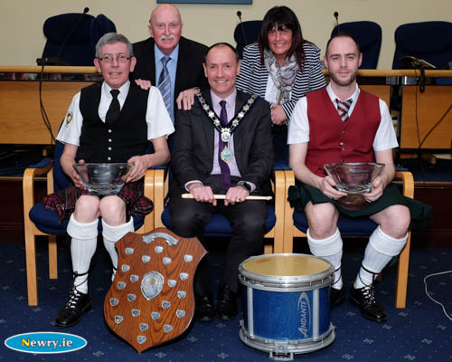 Cllr Mickey Ruane, Chairperson, Newry, Mourne and Down District Council presents Martin and Ronan Fitzpatrick with an award to mark their wins in the World Pipe Band Championships. Looking on are Cllrs Charlie Casey and Valerie Harte. Photograph: Columba O'Hare Cllr Mickey Ruane, Chairperson, Newry, Mourne and Down District Council presents Martin and Ronan Fitzpatrick with an award to mark their wins in the World Pipe Band Championships. Looking on are Cllrs Charlie Casey and Valerie Harte. Photograph: Columba O'Hare