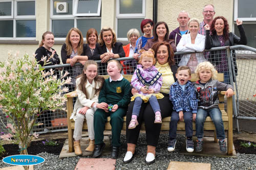 St Patrick's Primary School in The Meadow, Newry open their Sensory Garden at the school. Included are Cllr Gillian Fitzpatrick, Chairperson, Newry, Mourne and Down District Council, pupils, parents and Friends of St Patrick's. Photograph: Columba O'Hare