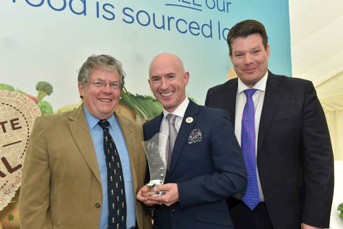 Philip Morgan from Around Noon receives the Award for Best Direct to Store Supplier from Agri-cultural Journalist Richard Wright and Neal Kelly, Director of Fresh Foods, Henderson Group.  
