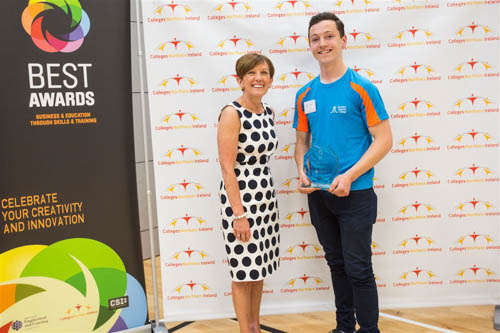 Dermot Savage from SRC who was the winner of the 16 to 18 age category is pictured with Beverly Harrison, Department of Economy.