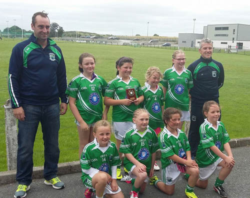 Shane O’Neill’s U10 girls and their managers after winning the plate in the Killeavy blitz