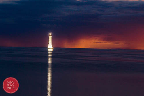 The Haulbowline Lighthouse illuminated to remember the Carlingford Lough boating disaster in 1916. Photograph: NewRayPics