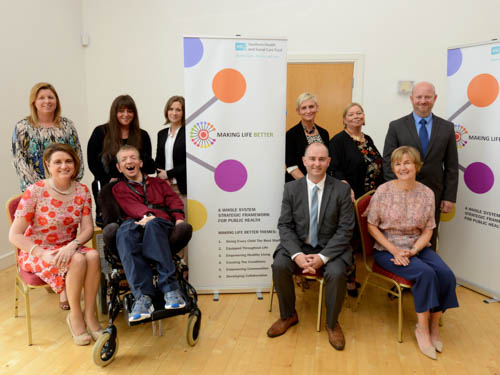 Speakers at the Making Life Better Showcase Event  Back row (L-R): Noreen O’Callaghan (ABC council), Ruth Hamilton (support worker), Tracey Powell (SHSCT), Fiona Teague (PHA), Donna Haughian (SHSCT), DR. Michael Hoy (SHSCT) Front Row (L-R): Roberta Brownlee (Chairperson, SHSCT), Ray Hamilton (PPI rep), Gerard Rocks (SHSCT), Angela McVeigh (SHSCT)