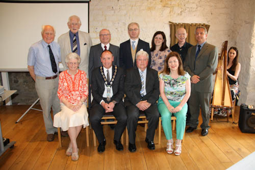 Pictured at the anniversary are Back Row L-R: Ex Members of the Museum Committee, Ross Chapman and Sean McManus; first Museum Officer, Tony Canavan and Museum staff Ken Abraham, Joanne Cummins, Greag Mac a’t Saoir and Declan Caroll Front Row L-R: Ex Chair of Museum Committee, Marie O’Donnell; Newry, Mourne and Down District Council Chairperson, Cllr. Mickey Ruan; Ex Chairman of Newry and Mourne District Council, Pat Toner who officially launched the Museum in 1986 and Noreen Cunningham, Museum Curator.