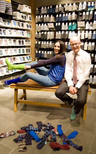 Laura McGuigan and Peter Murray in JACK&JONES, Buttercrane Shopping Centre, who are running a special facebook competition to support ODD SOCK DAY.