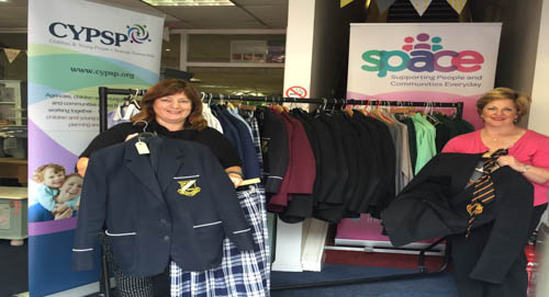 Allison Slater SPACE representative, and Martina Flynn Community Development Worker, with some of the uniform items already donated.