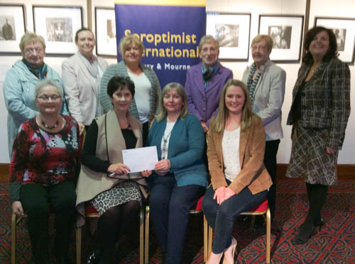 Hilary Halliday accepts a cheque for £1,500 on behalf of the Club’s chosen charity Friends of the Cancer Centre Belfast in memory of her daughter Anthea who passed away last August and who had received such care from the Friends of the Cancer Centre.