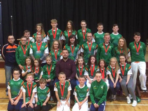 Cathal Fegan and his Taekwondo School pictured with Cllr Kevin McAteer.