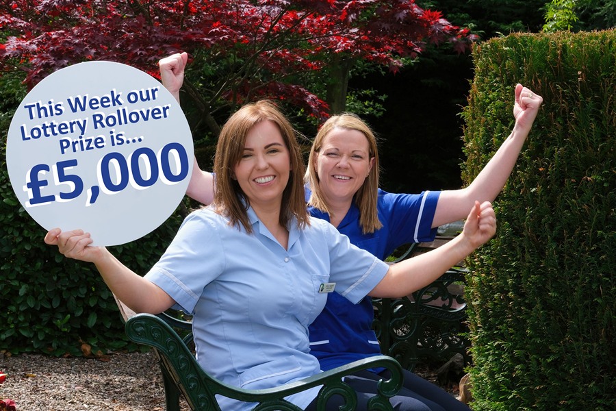 Southern Area Hospice Nursing Auxiliary Jolene Campbell & Hospice Nurse Jenny McLaughlin celebrate the £5,000 rollover prize. 