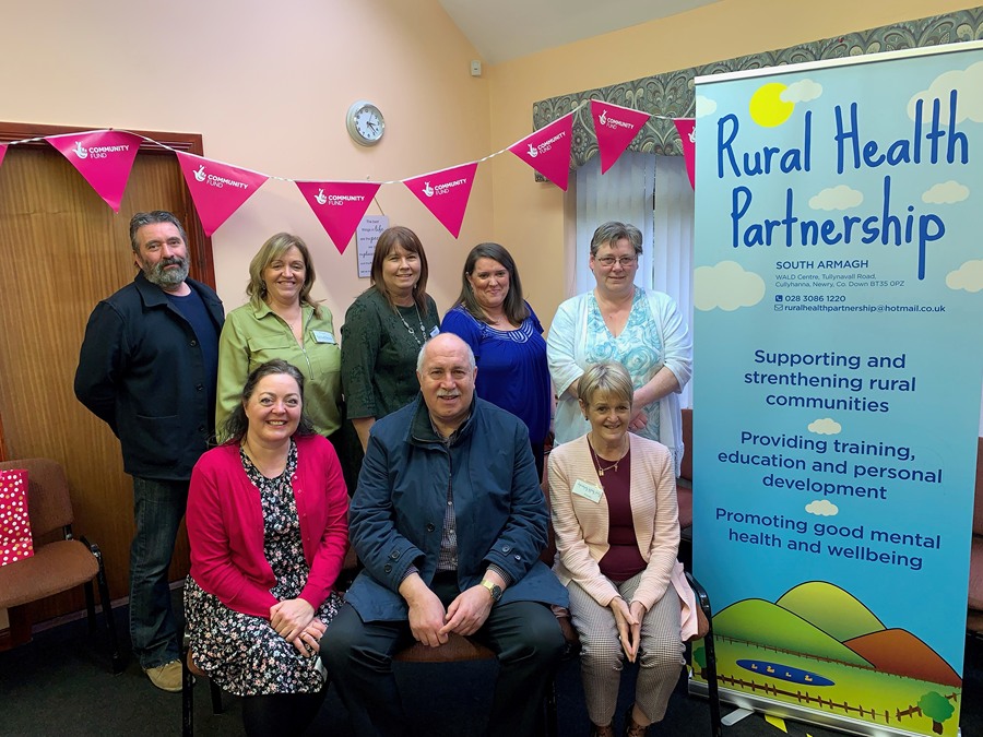 Pictured at the function are front from left: Lesley Johnston and Andy Hall Funding Officers at Lottery Community Fund with Mrs Teresa Nugent CEO RHP pictured with members of the Rural Health Partnership Lottery Steering Committee and Staff.