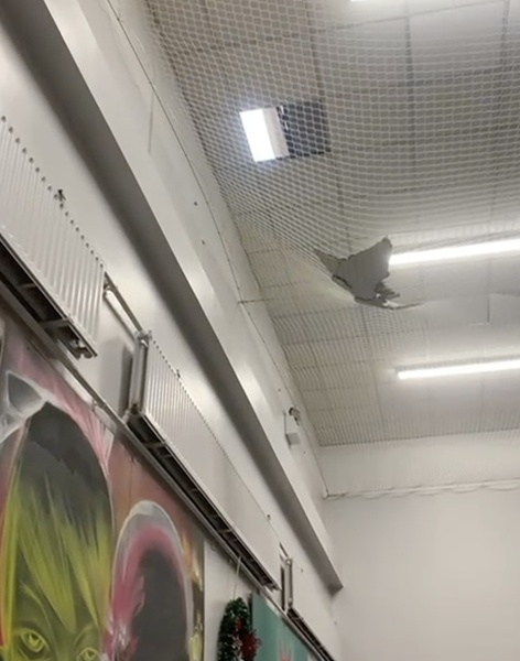 A hole in the roof of the main hall at Newry Gateway Club.