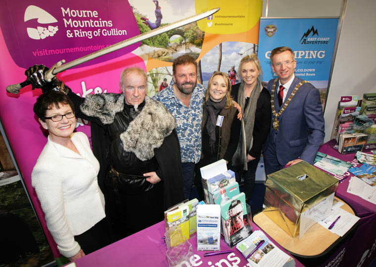 Pictured at the 25th Holiday World Show in Titanic Exhibition Centre, Belfast, on the Destination Mourne Mountains & Ring of Gullion stand, are (l-r) Holiday World’s Paulette Moran; Lord of Winterfell aka William Van Der Kells; TV celebrity Martin Roberts; Jennifer Cumming, Patricia O’Hare; and Lord Mayor of Belfast, Ald. Brian Kingston.