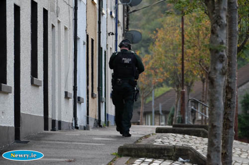 A policeman in St Clares Avenue during the incident. Photograph: Columba O'Hare 